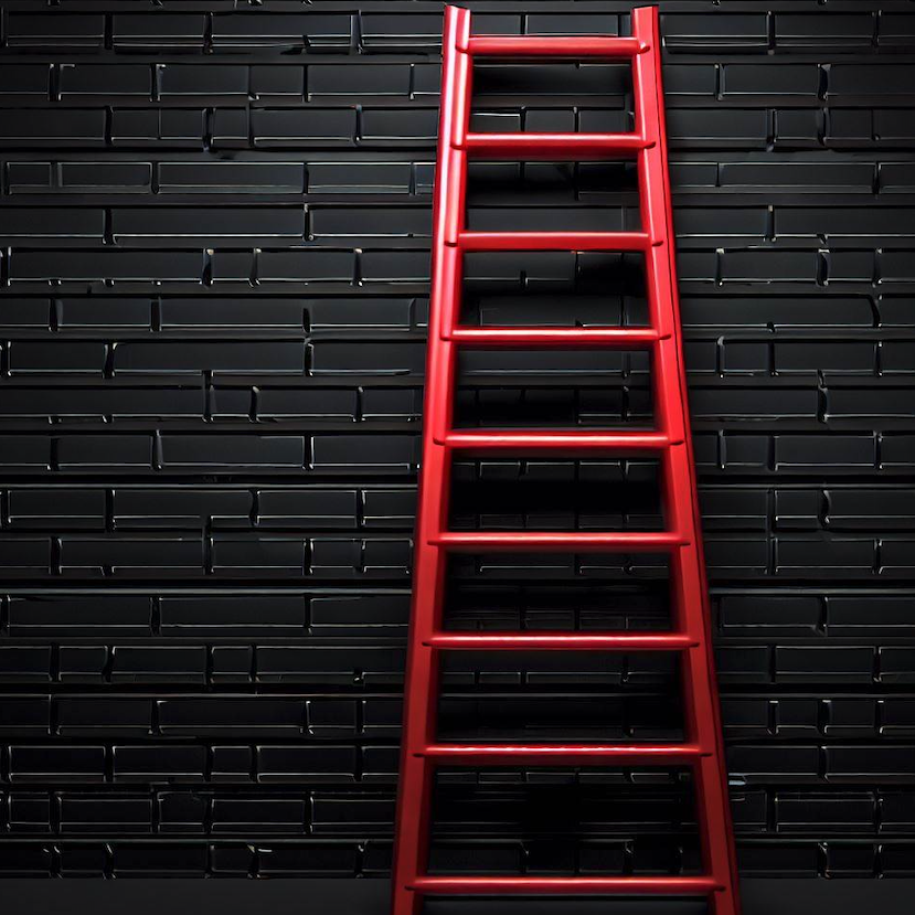 A red ladder against grey wall representing different padel levels